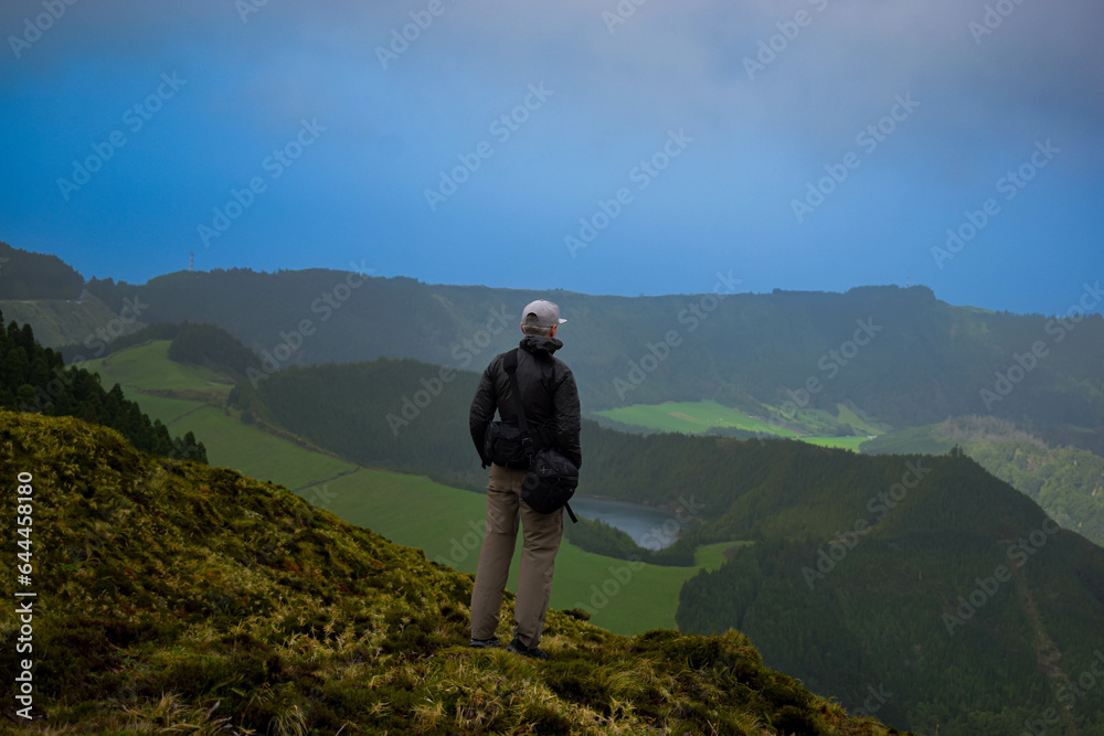 Man observing a beautiful landscape in Azores Man observing a beautiful landscape in Azores