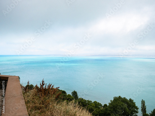 above view of Lake Sevan from Sevan Monastery on cloudy summer day, Armenia