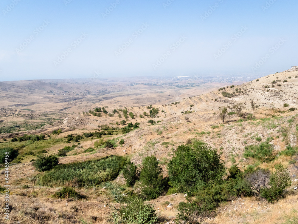 view of Armenian lands from Arch of Charents, located in village of Voghaberd, Kotayk region, on Yerevan - Garni road on sunny summer day