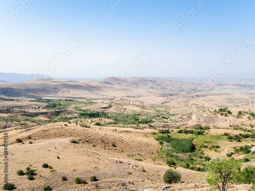 Armenian landscape near Arch of Charents, located in village of Voghaberd, Kotayk region, on Yerevan - Garni road on sunny summer day