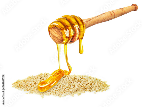 dripping honey on sesame seeds isolated on white background