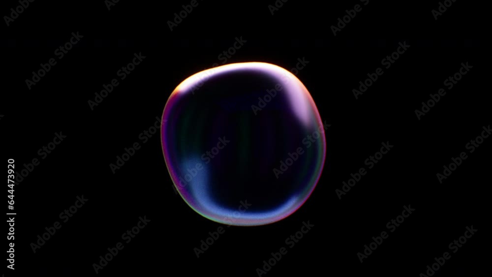 Single Soap bubble isolated flies over a black background for compositing. Seamless loop. Abstract smooth liquid shape
