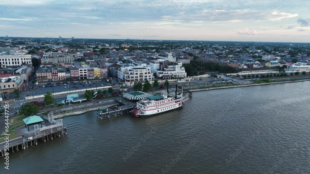 Aerial view of New Orleans skyline at twilight along the Mississippi River, Louisiana, United States. Aerial view of New Orleans skyline at twilight along the Mississippi River, Louisiana, United States.