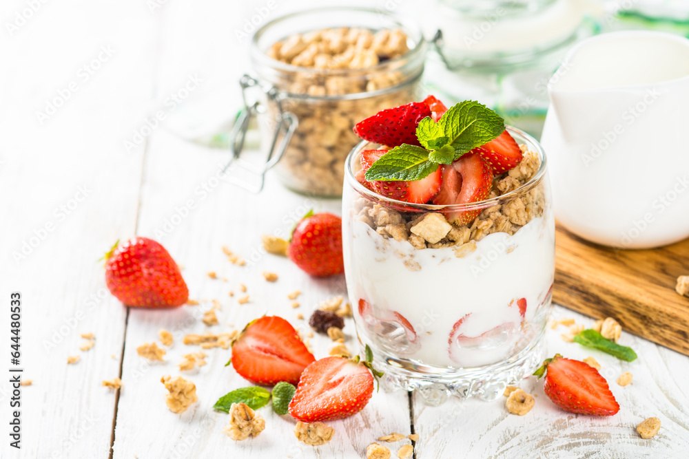 Greek yogurt with fresh strawberry and granola. Parfait. Greek yogurt with fresh strawberry and granola. Parfait.