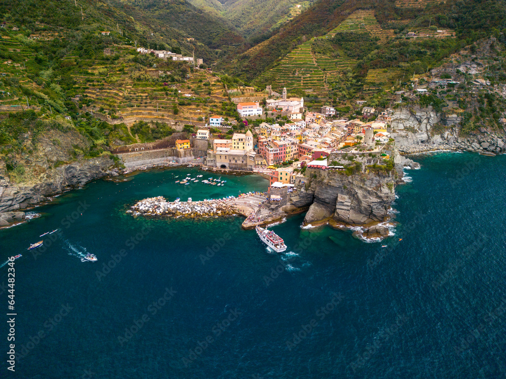 small towns of Italy on the coast, sunny weather, drone photography, warm light, blue sea