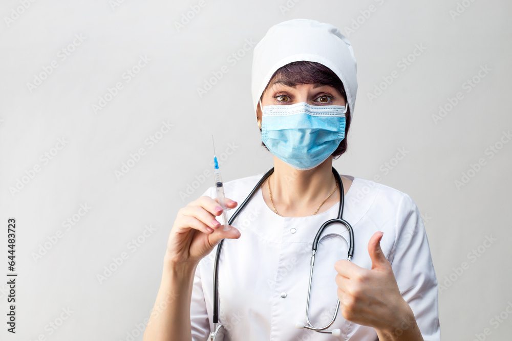 Woman doctor rejoices that there is a vaccine against the disease. Woman doctor rejoices that there is a vaccine against the disease.