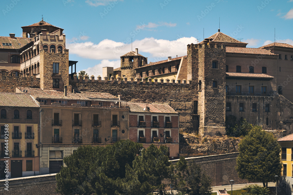 Ancient architecture against blue cloudy sky of Segovia city. Castilla y Leon. Spain