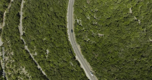 Aerial view of a road on the hills following the Limski Fjord (Canal di Leme) in Sveti Lovrec, Istria, Croatia. photo