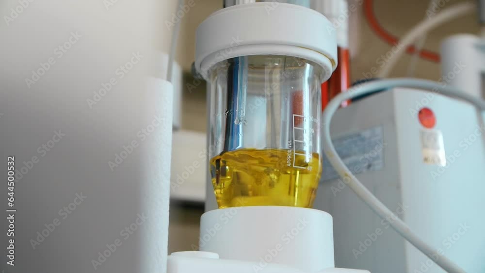Apparatus in a medical laboratory for dissolving, testing tablets, dissolving tablets in liquid. Apparatus in a medical laboratory for dissolving, testing tablets, dissolving tablets in liquid.