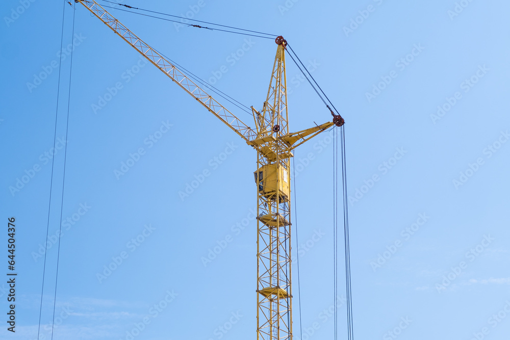 Builders work on large construction sites, and there are many cranes working in the field of new construction. Builders work on large construction sites, and there are many cranes working in the field of new construction.