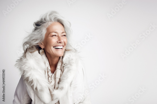 60-70 year old woman with autumn winter outfit. Senior old woman, female lifestyle.  Fashion model . © Vanessa GF