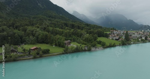 Aerial view of the Brienzersee Lake in summertime with rain and low clouds, Bern, Switzerland. photo