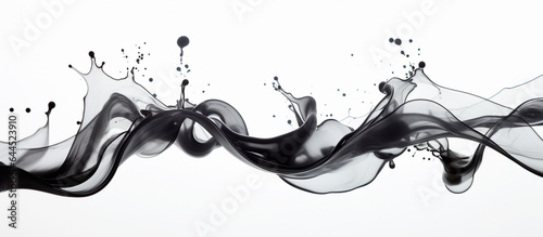 Spreading black ink in water, background.