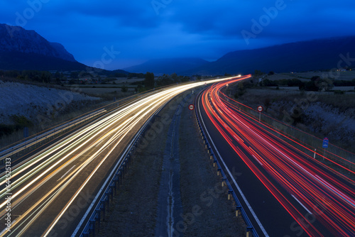 Cars at night drive along the highway quickly, Araba, Euskadi