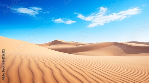 Daytime Adventure on Moroccan Sand Dune in Merzouga Desert. Arabian Landscape with Blue Sky in Background