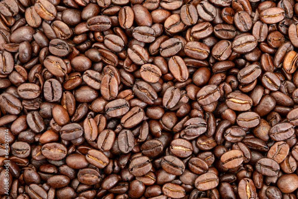 Grains of roasted aromatic coffee background Grains of roasted aromatic coffee background