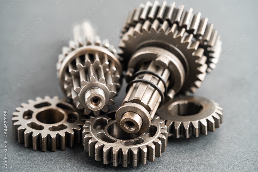 Gear and cogs wheels, clock mechanism, brass metal engine industrial.