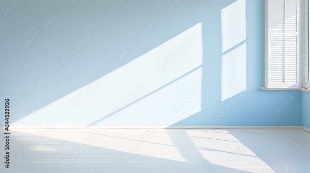 A Blurred Shadows on Pastel blue Wall, Sunlight through Window, white wooden floor, blank space for presentation A Blurred Shadows on Pastel blue Wall, Sunlight through Window, white wooden floor, blank space for presentation