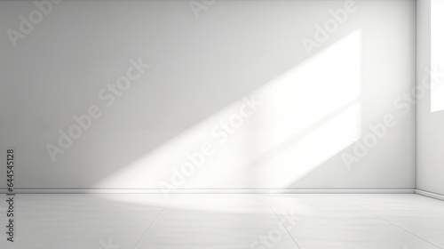 abstract. minimalistic background for product presentation. walls in large empty room greyish white. can full of sunlight. Loft wall or minimalist wall. Shadow, light from windows to plaster wall...