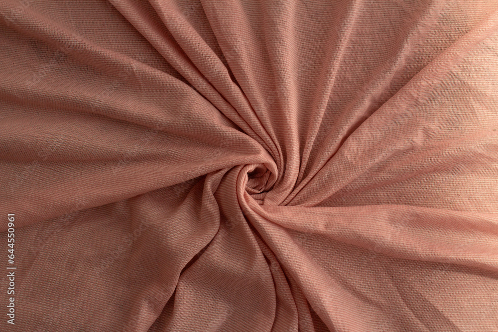 Closeup na textura do tecido na cor rosa seco. Foto para fundo em full frame. Closeup na textura do tecido na cor rosa seco. Foto para fundo em full frame.