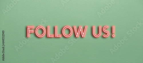 Follow us neon text on a green wall