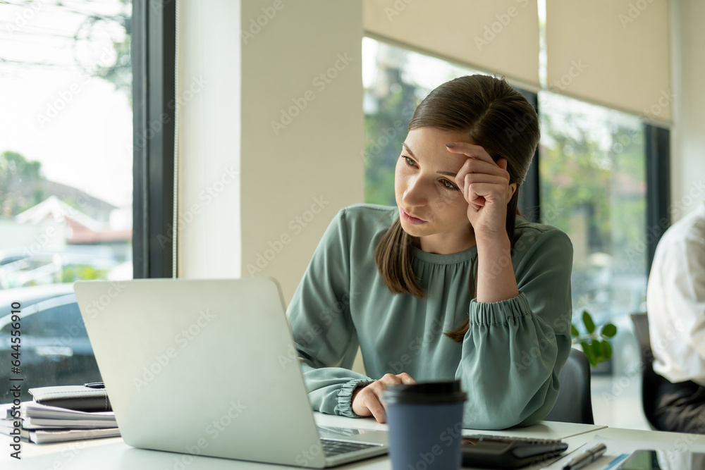 Businesswoman tired and stressed about work. Businesswoman tired and stressed about work.
