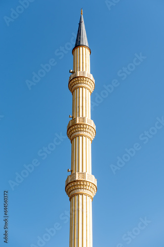 one minaret of traditional Islamic mosque in Grozny Chechnya