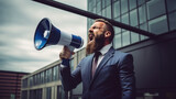 businessman shouting through a megaphone outside in front of office building 