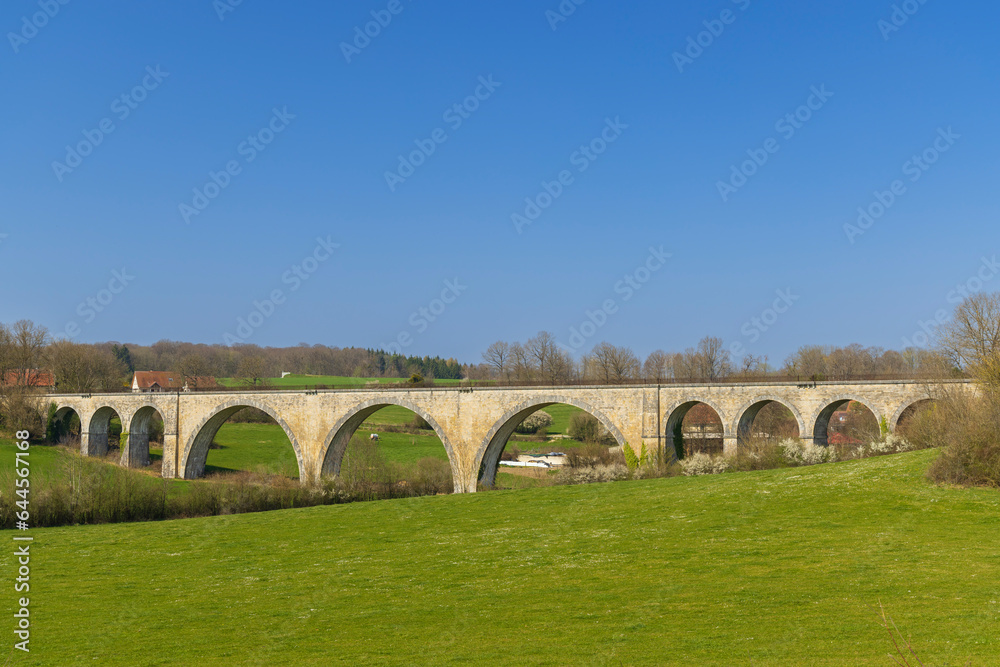 Arched stone railway bridge onabandoned railway near Cognieres, Doubs, France Arched stone railway bridge onabandoned railway near Cognieres, Doubs, France