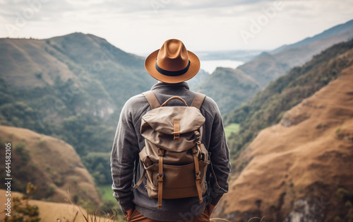 Young traveler wearing a hat with backpack hiking outdoor Travel Lifestyle and Adventure concept