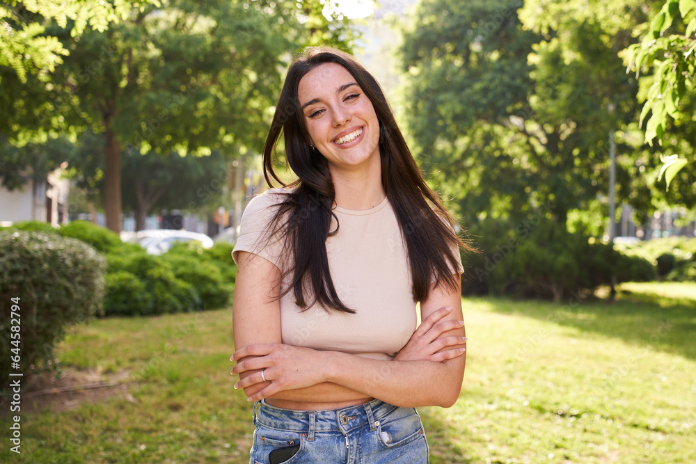 Close up of young smiling woman looking camera. Attractive female laughing standing on street city lifestyle. Beautiful happy girl outdoors. Funny lady emotional expression on urban background. Close up of young smiling woman looking camera. Attractive female laughing standing on street city lifestyle. Beautiful happy girl outdoors. Funny lady emotional expression on urban background.