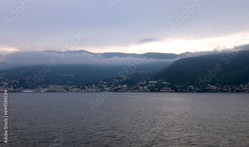 while you are arriving at the port of Bastia in Corsica during sunrise