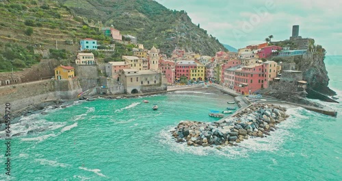 Aerial drone landscape of Vernazza, Italy Colorful Cliffside Town the Seaside Mountainous of famous Cinque Terre, Liguria, Northern Italia on Tyrrhenian sea in summer day. Coastal travel village.