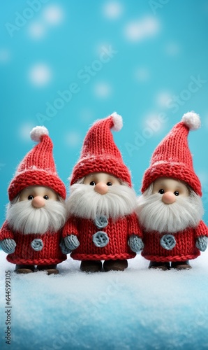 3 cute Santa get together in snow fall on blue blurred snowy forest background, concept of Merry Christmas, with copy space, Vertical.