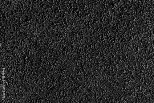 Texture of black coarse-grained asphalt, background.