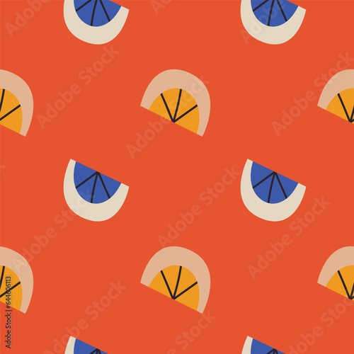 Vector seamless pattern with slices of lemons on orange background. Design for fabric and paper, surface textures.