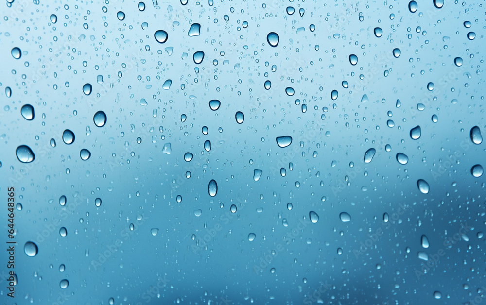 Raindrops on the window. Blue tone Raindrops on the window. Blue tone
