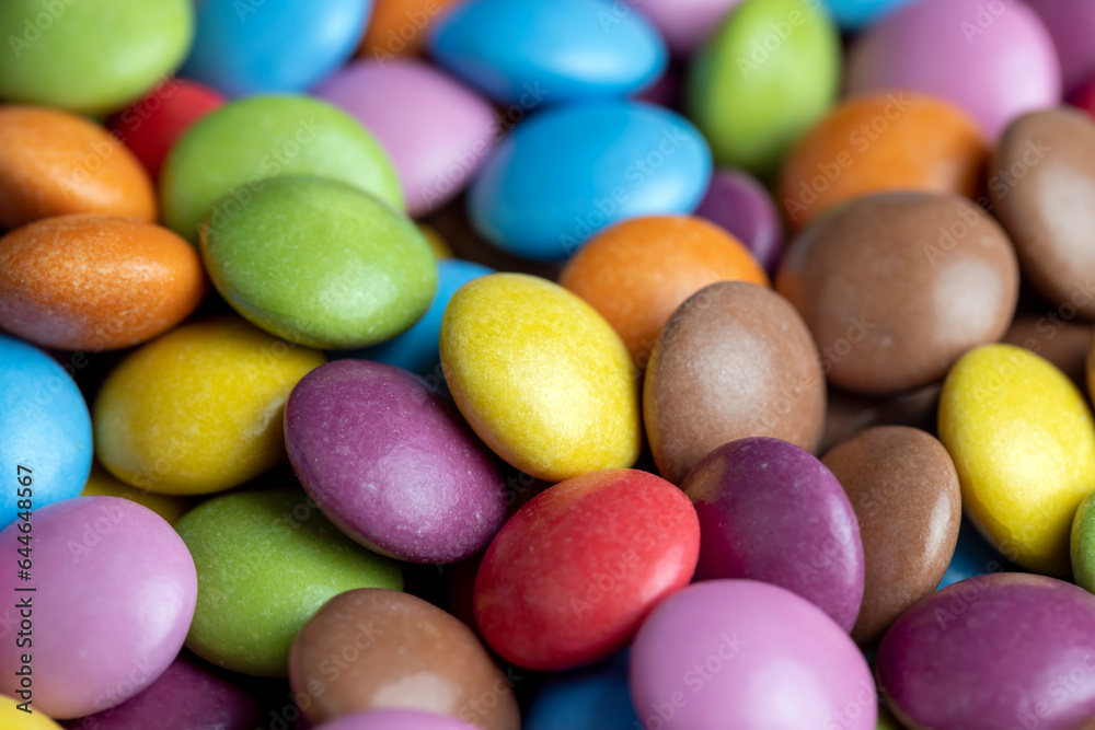 Multicolored chocolates with chocolate filling Multicolored chocolates with chocolate filling