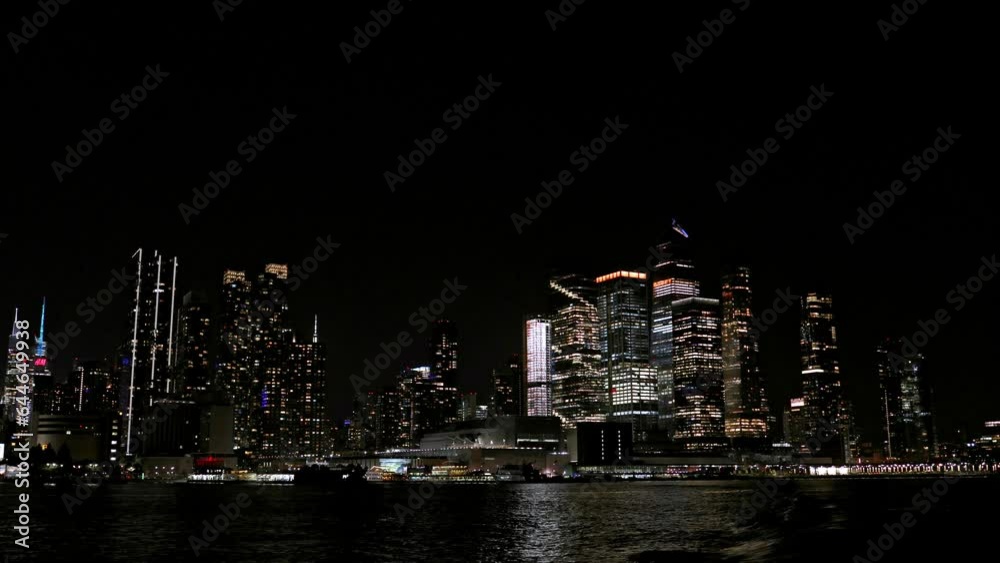 New York skyline in night lights, midtown Manhattan. Breathtaking panoramic view of night city financial district with skyscrapers. Night view of modern urban architecture landscape. New York skyline in night lights, midtown Manhattan. Breathtaking panoramic view of night city financial district with skyscrapers. Night view of modern urban architecture landscape.