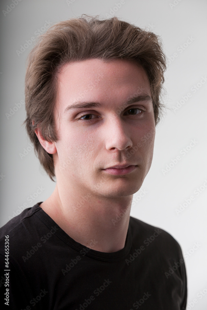 Young man's gaze suggests deep knowledge, opinions Young man's gaze suggests deep knowledge, opinions