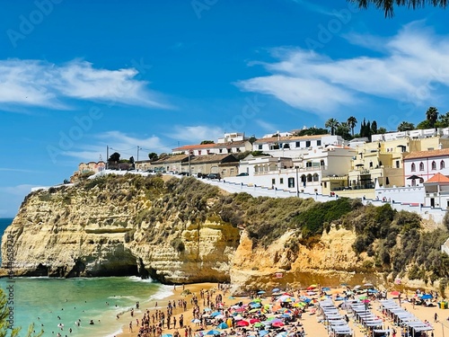 View of Carvoeiro fishing village with beautiful beach, Algarve © Evis