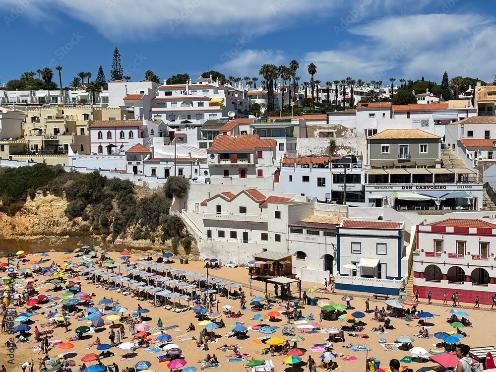 Obraz premium View of Carvoeiro fishing village with beautiful beach, Algarve