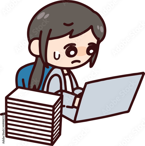 残業するスーツの女性