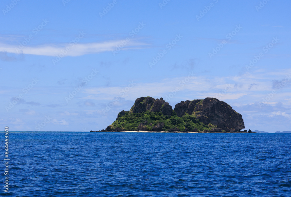 igneous mountains under blue sky in fiji