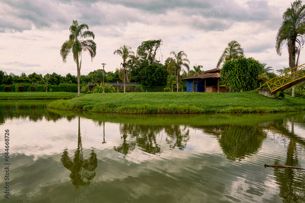 Serene Reflections: Tropical Paradise in Quindío. Colombian coffee axis. Tourist spaces in Quindio.