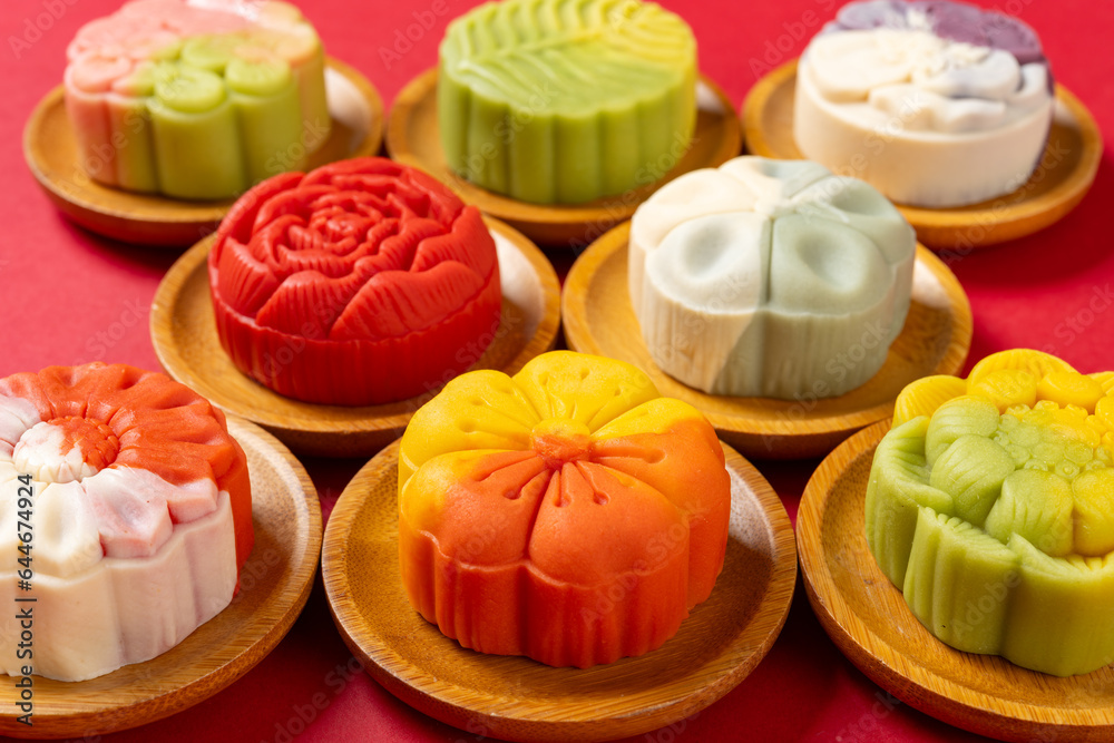 angle view trendy different flower shapes mooncakes on red horizontal composition angle view trendy different flower shapes mooncakes on red horizontal composition