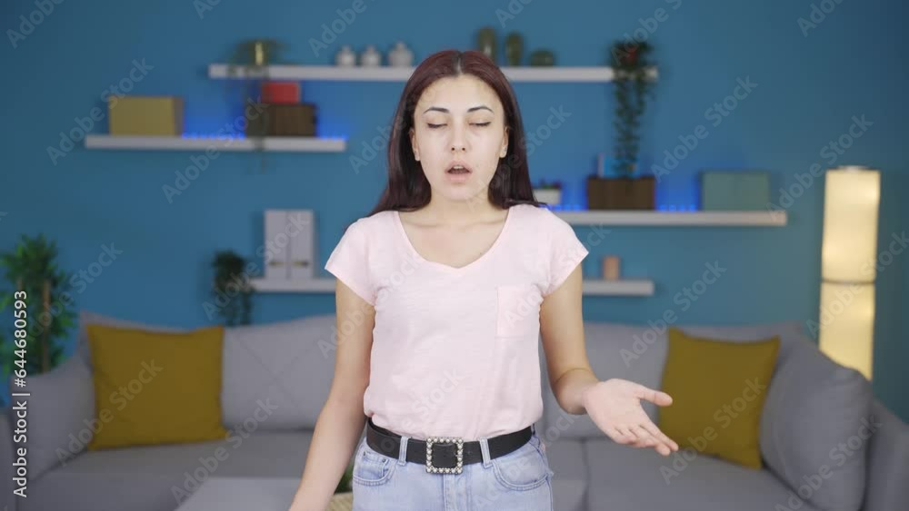 Woman looking at camera in amazement. Woman looking at camera in amazement.