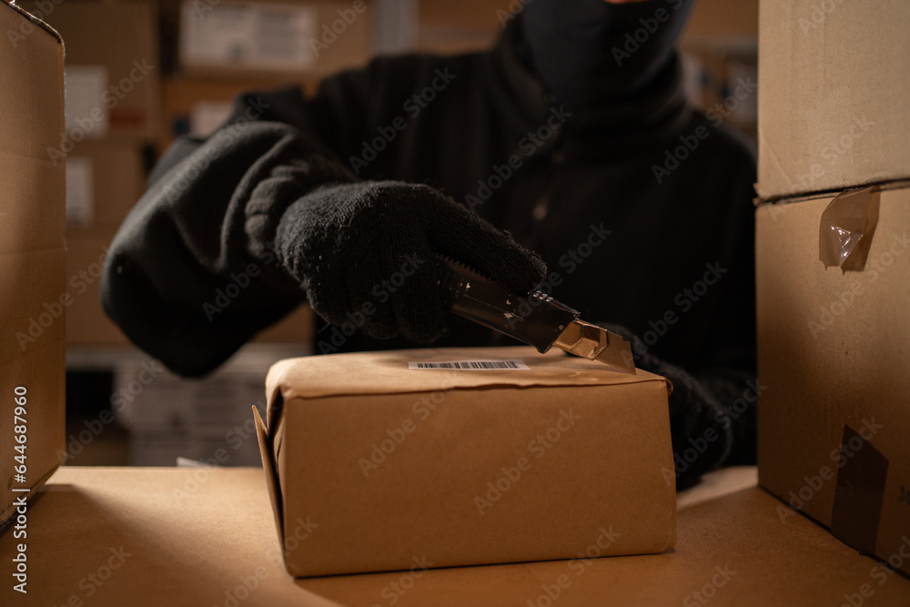 Stealing parcels and damaging the packaging of goods in the warehouse