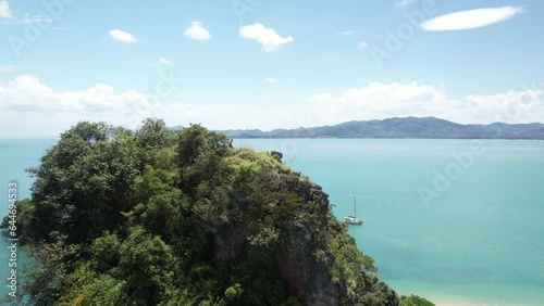 4K Aerial Footage of Koh Nok, Phang Nga Bay, Andaman Sea, Thailand - Featuring White Sand Beaches and Crystal Clear Waters photo