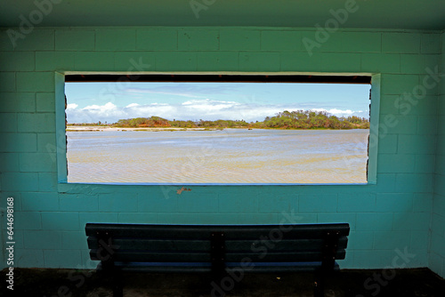Bench and window with the view of Kanaha Pond Wildlife Sanctuary, Maui, Hawaii